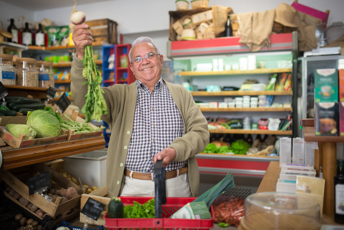 Elderly Man holding Vegetables
